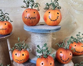 Pumpkin face decoration. Miniature pumpkin sculpture. Halloween ornament. Autumn fall decor