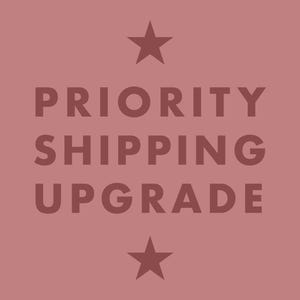 May include: A pink background with the text "PRIORITY SHIPPING UPGRADE" in brown text. Two brown five-pointed stars are above and below the text.