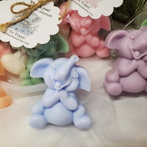 May include: A set of three ceramic mugs with a speckled, matte finish. The mugs are in shades of cream, light gray, and dark gray. Each mug has a simple, minimalist design, perfect for coffee or tea.