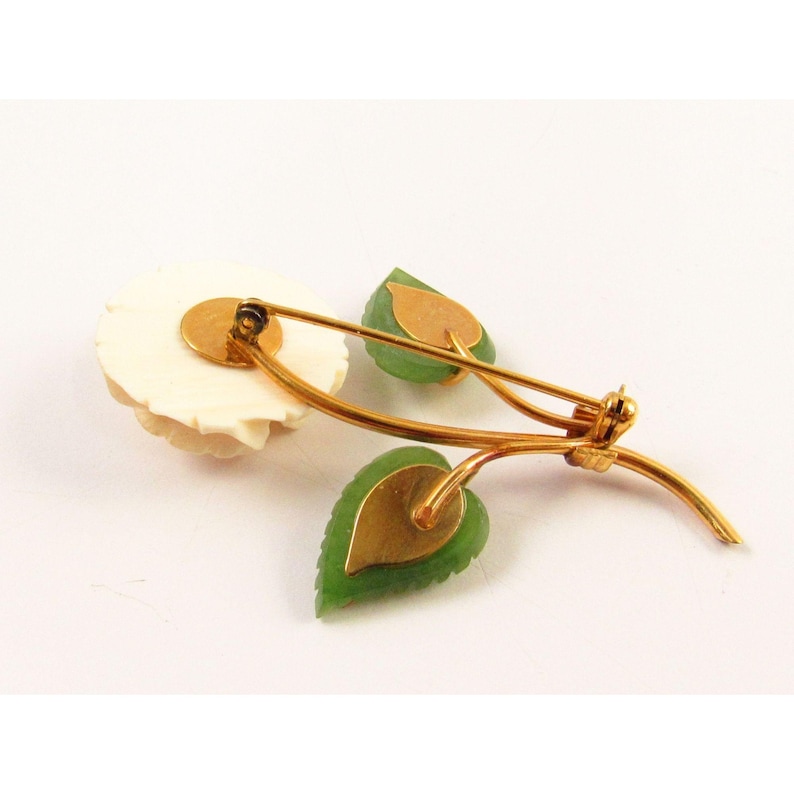 White Celluloid Flower Brooch with Faux Jade Leaves Signed HCA 120 12K GF JA7 017