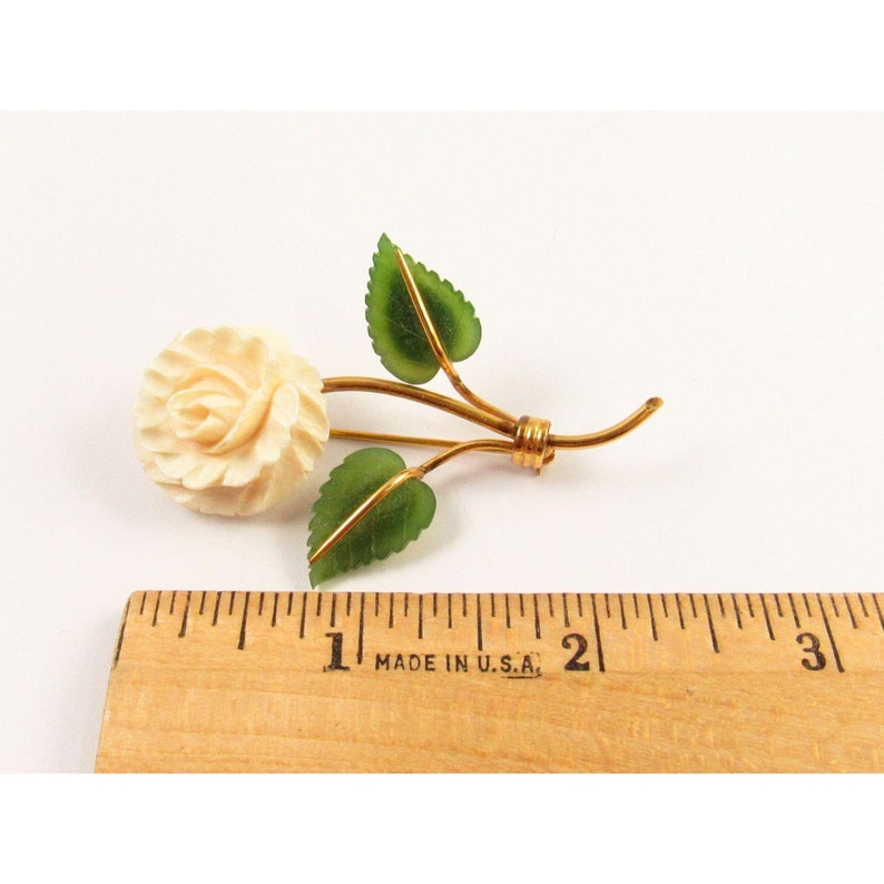 White Celluloid Flower Brooch with Faux Jade Leaves Signed HCA 120 12K GF JA7 017