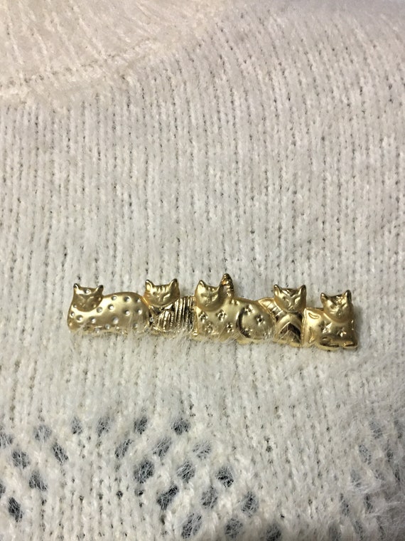 Multi cat brooch Gold Tone