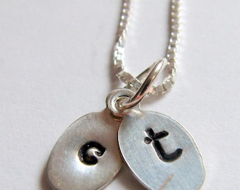 Personalized, hand-stamped, sterling silver, initials charm necklace.
