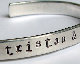 Personalized, hand-stamped aluminum cuff bracelet.