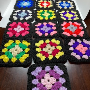 Crocheted Granny Squares Multicolors With Black Background