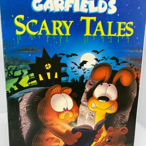 1990 Garfield's Scary Tales illustrated Jim Davis Garfield the Cat, Odie and Jon Soft Cover Book Halloween Stories