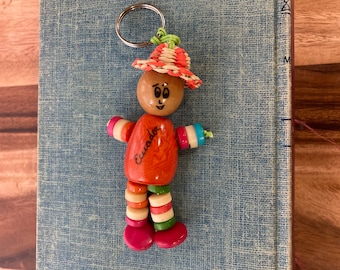 Vtg Ecuador keychain orange stone man in straw hat Manta Ecuador
