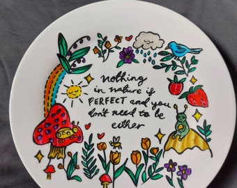 Large handpainted " Nothing in nature is perfect" plate