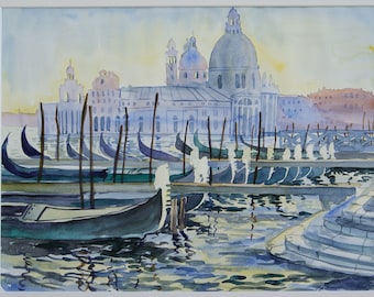 May include: A watercolor painting of a cityscape with a large church building in the background and a row of gondolas in the foreground. The water is a light blue color and the sky is a pale blue. The church has a large dome and a tall steeple. The gondolas are all lined up in a row, with their bows facing the viewer. The painting is done in a soft, muted palette.