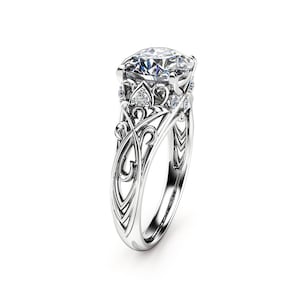Art Nouveau Moissanite Engagement Ring with Sculpted Scroll and Side Diamond Accents