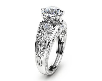 14 kt witgouden art-deco verlovingsring met gegroeide diamant