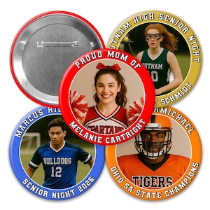 May include: Four circular pinback buttons featuring photographic portraits of athletes and a cheerleader. The buttons display text including "PROUD MOM OF MELANIE CARTRIGHT," "PUTNAM HIGH SENIOR NIGHT," "MARCUS RICHTER SENIOR NIGHT 2026," and "CARMICHAEL OHIO 5A STATE CHAMPIONS."