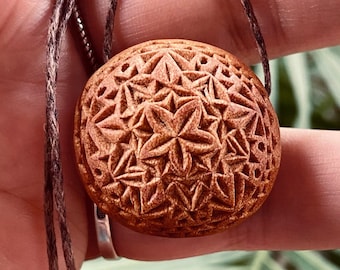 Hand carved avocado stone necklace with intricate Crazy Lace chip carving geometric design. Natural jewelry. Gift for him. Gift for her.