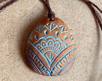 Carved avocado pit necklace with blue-green accents | Chip carving | Gift for avocado lover | Abstract art design |