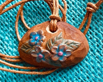 Carved avocado pit necklace. Flowers. Natural jewelry . Floral pendant. Blue flowers