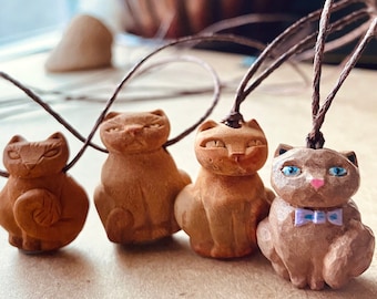 Handcarved avocado pit cat. Unique and beautiful :) Avocato. Cat jewelry. Cat lover necklace . Present for a cat person.