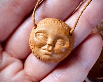 Hand carved avocado pit full moon choker necklace 16inches.  Moon face. Celestial jewelry.