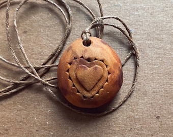 Natural jewelry. Hand carved avocado stone necklace. Heart. Love pendant.