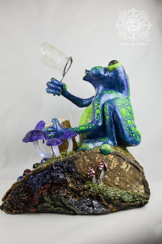 Blue frog sculpture named "Don't burst my bubble!"