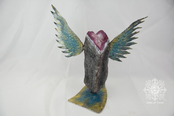 Stone and metal sculpture, angelic and spiritual heart chakra. (When the heart becomes less heavy. )