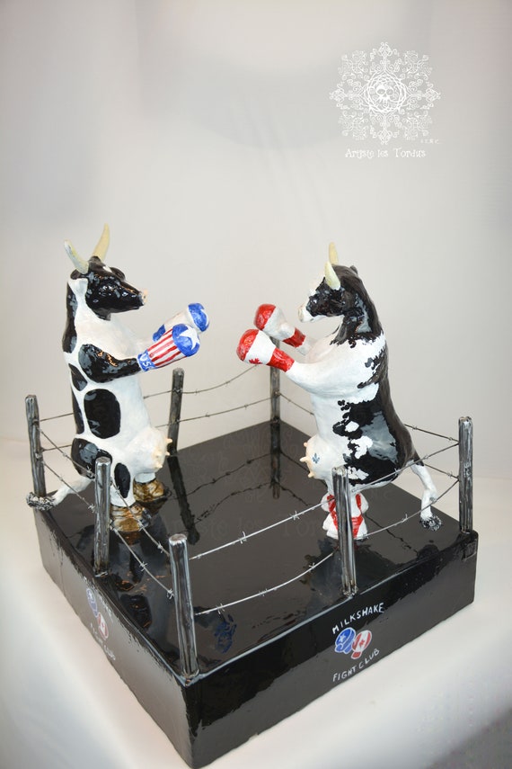 Humorous metal and resin sculpture related to cows and milk. Shakes (Milk Shake)