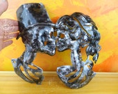 Santa Muerte,iron,wrought iron,skull,men,woman,gift,bar,bathroom,restroom,artiste les tordus,forged,toillette