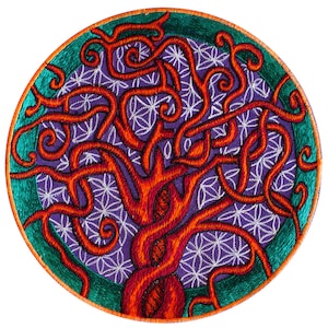 May include: Circular embroidered patch with a tree design. The tree is depicted in orange and red, with swirling branches on a purple background. The patch has a teal border and a white floral pattern. The patch is suitable for clothing or accessories.