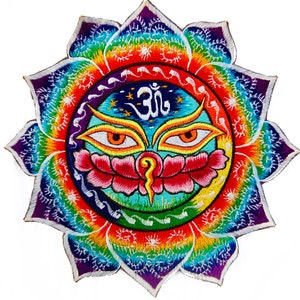 May include: Embroidered patch featuring a colorful lotus flower design with a central eye motif and the Om symbol. The patch showcases a vibrant rainbow color scheme and intricate stitching details.