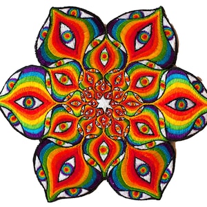 May include: A colorful embroidered patch with a mandala design featuring multiple rainbow-colored eyes. The patch is circular and has a black outline.