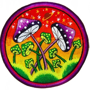 May include: Embroidered patch featuring a colorful psychedelic mushroom design. The patch has a circular shape with a purple border. The design includes purple and white mushrooms, green grass, and a red and orange sky with stars and a planet.