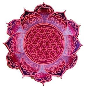 May include: Embroidered patch featuring a lotus flower design with a central Seed of Life pattern. The patch showcases a gradient of pink and purple hues, with intricate detailing and a decorative border. This patch is suitable for clothing or accessories.