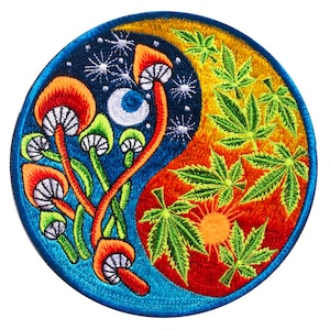 May include: Embroidered patch with a yin-yang design. One side features orange mushrooms, a moon, and stars on a blue background. The other side has green cannabis leaves and a sun on an orange and yellow background. The patch has a blue border.