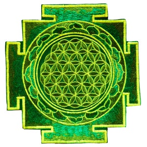 May include: Embroidered patch featuring a geometric design with a central circle of interconnected flower-like shapes. The patch has a green and yellow color scheme, with a square outer border and a circular inner design.