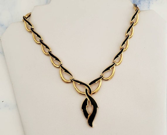 Vintage MONET Black Enamel and Gold Tone V Shaped… - image 1