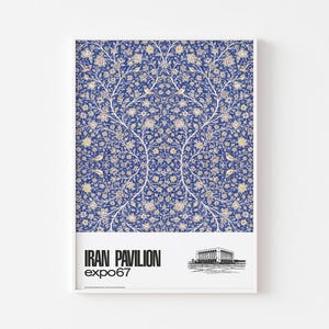 May include: A framed print featuring a detailed floral pattern in blue, white, and gold. The design includes stylized birds and branches. The bottom of the print has the text "IRAN PAVILION expo67" with a black and white architectural illustration.