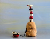 Lighthouse , miniature ceramic sculpture , miniature lighthouse with tiny ceramic bird / handmade ceramics and pottery  / one of a kind