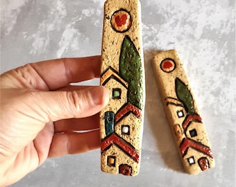 Handmade ceramic Jewish Mezuzah with Israeli houses view carved and painted on it