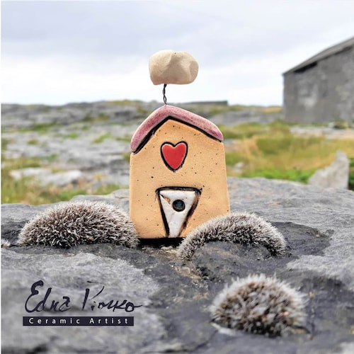 陶器でできた壁掛け il_fullxfull.3672446504_ebga.jpg