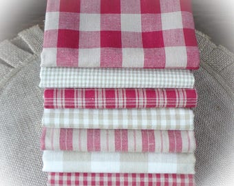 May include: A stack of eight red and white gingham fabric squares. The fabric is a linen blend and has a rustic, farmhouse style.