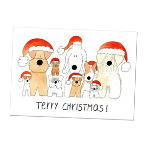 Könnte beinhalten: Eine Weihnachtskarte mit einer Gruppe von Hunden, die Weihnachtsmützen tragen. Die Karte sagt "Terry Christmas!"