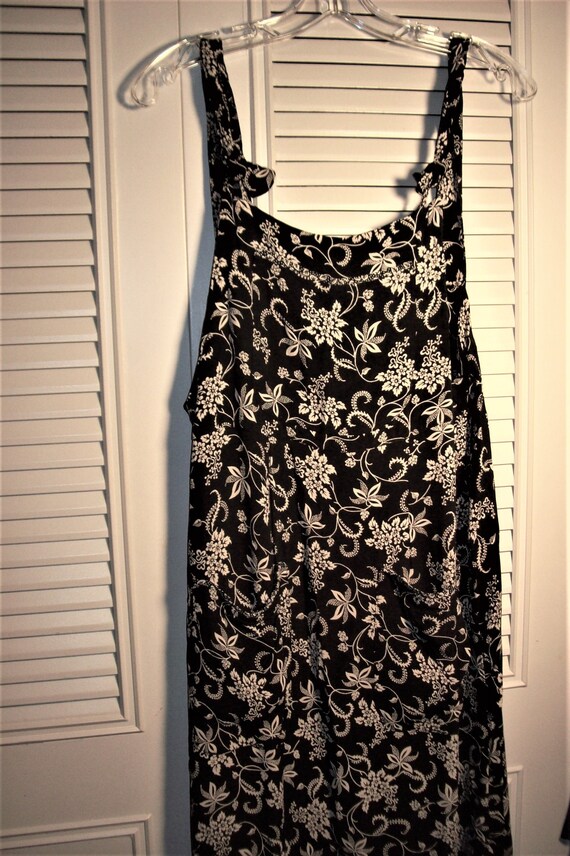 dress with small shoulder straps worn in summer