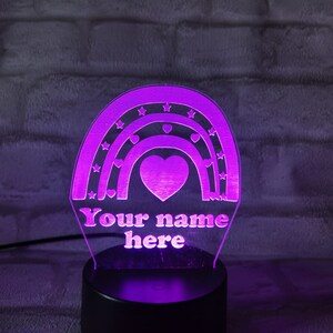 Rainbow hearts and stars LED colour changing light up sign with name. Can be personalised. Excellent night light for children.