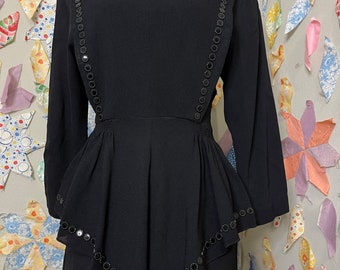 black peplum dress with sleeves