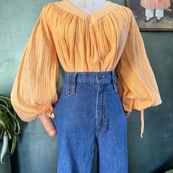1970s  orange crinkle cotton balloon sleeve top