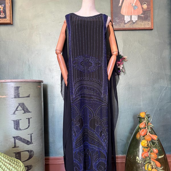 1920s  Black chiffon and cobalt blue heavily beaded drop waist dress