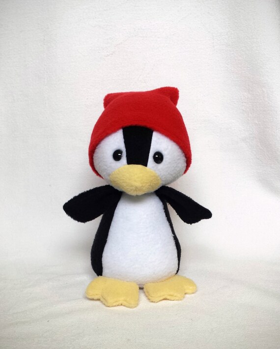 peluche pingouin gros yeux