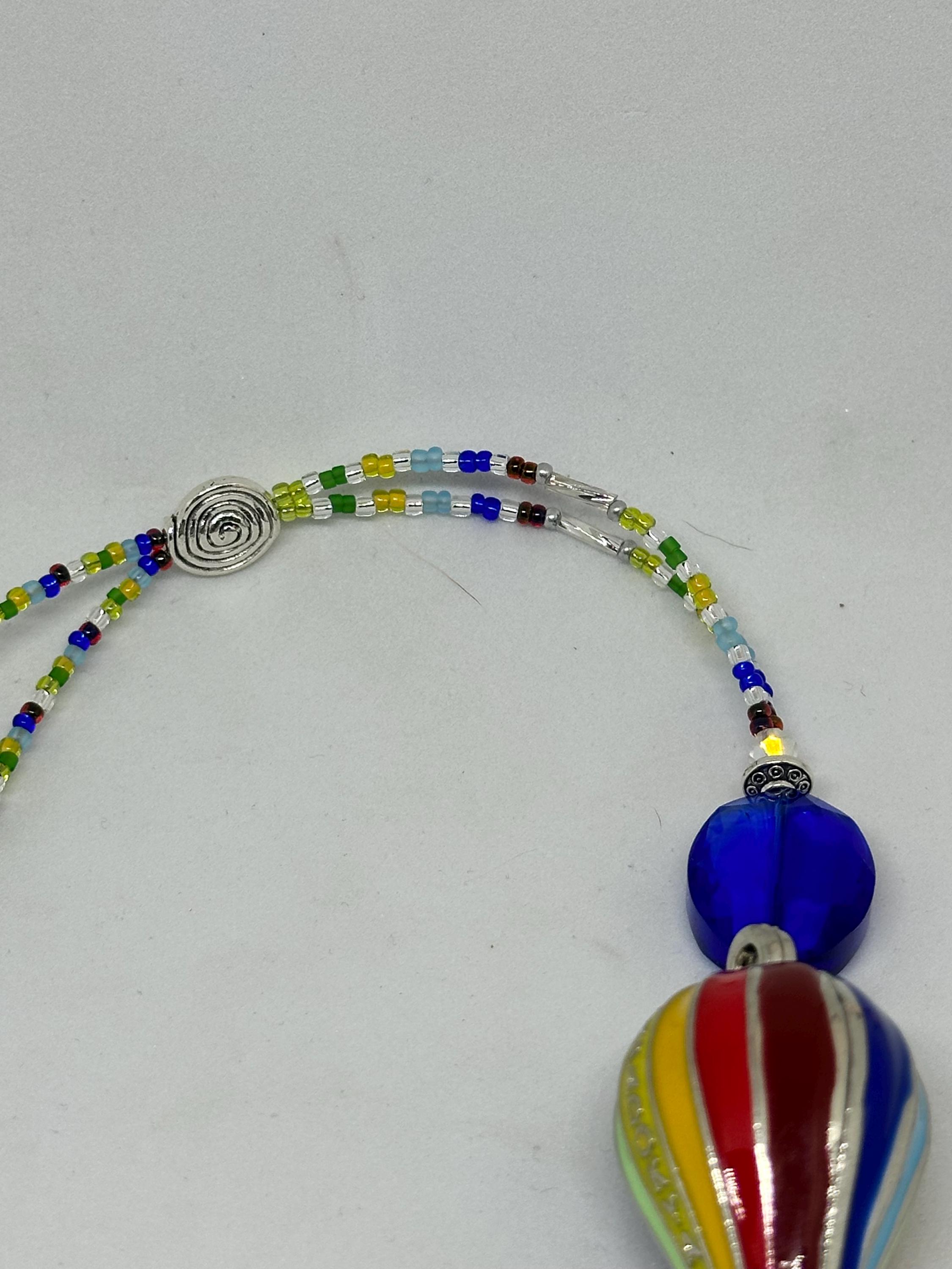 thumbnail image 2 of Handmade Macrame Rainbow Car Mirror Hanging 2 of 11