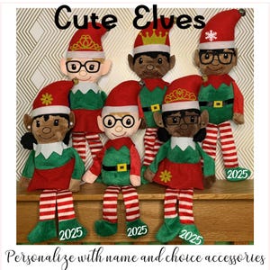 May include: A group of plush elves wearing red and green outfits with striped legs. Each elf has a red hat and glasses. The text "Cute Elves" and "Personalize with name and choice accessories" are displayed.