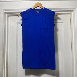 Canotta vintage blu scuro con tasca a punto singolo