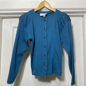 Camisa azul vintage de manga comprida com botões dos anos 80